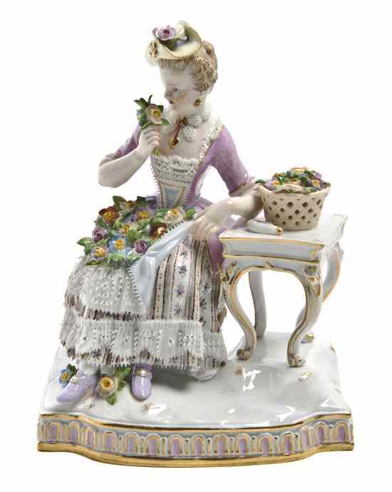 Appraisal: A Meissen Porcelain Figure depicting a girl seated at a