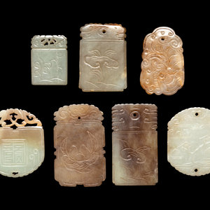 Appraisal: Seven Chinese Celadon Jade Carved Plaques each stone has russet