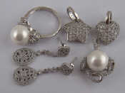 Appraisal: A quantity of white metal tests silver jewellery comprising three