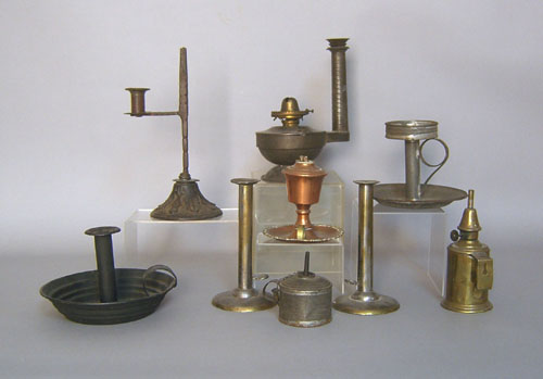 Appraisal: Nine pcs of lighting th c to include candlesticks and