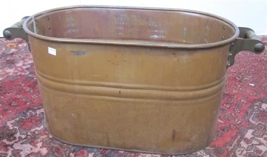 Appraisal: WASH TUB An antique copper oval boiler mounted with twin