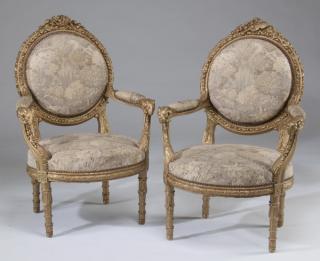 Appraisal: Louis XVI style carved fauteuils after Amaury Pair of Louis