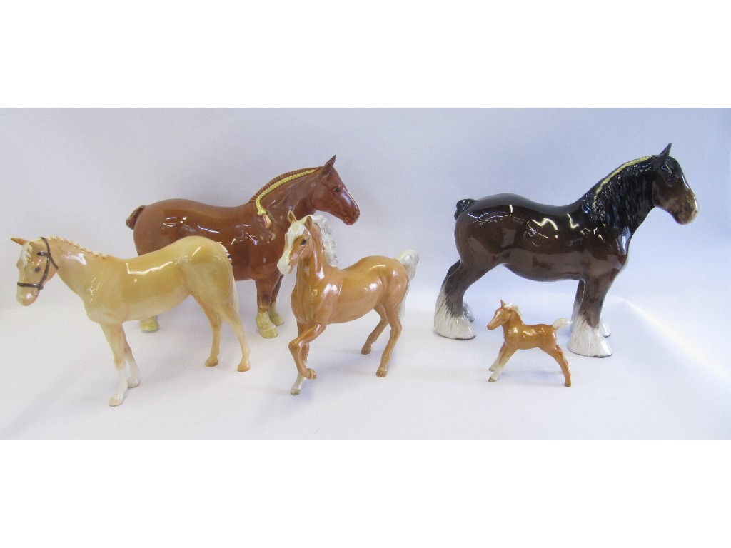 Appraisal: Five Beswick horses including Palomino and foal Palomino H Suffolk