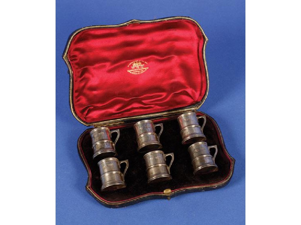 Appraisal: A SET OF SIX EDWARDIAN MINIATURE BEER MUGS modelled in