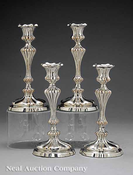 Appraisal: A Set of Four Antique Sheffield Plate Candlesticks c -