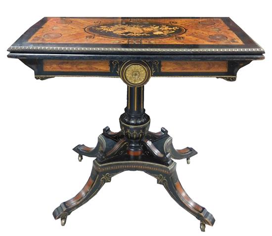 Appraisal: Victorian Rococo style flip top card table ebonized with gilt