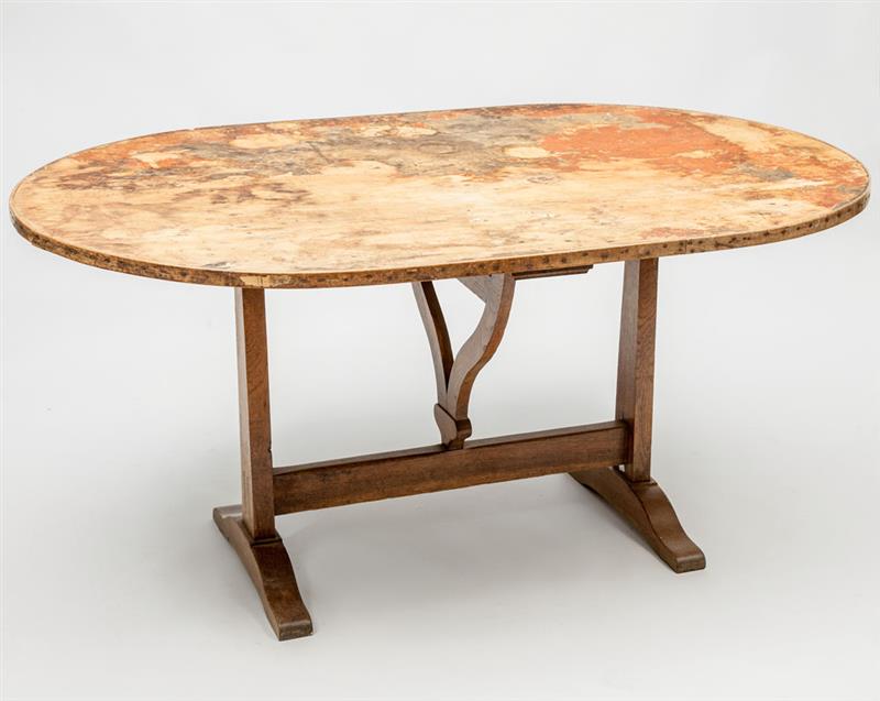 Appraisal: Stained Oak Oval Tilt-Top Trestle Table On gate-leg support in