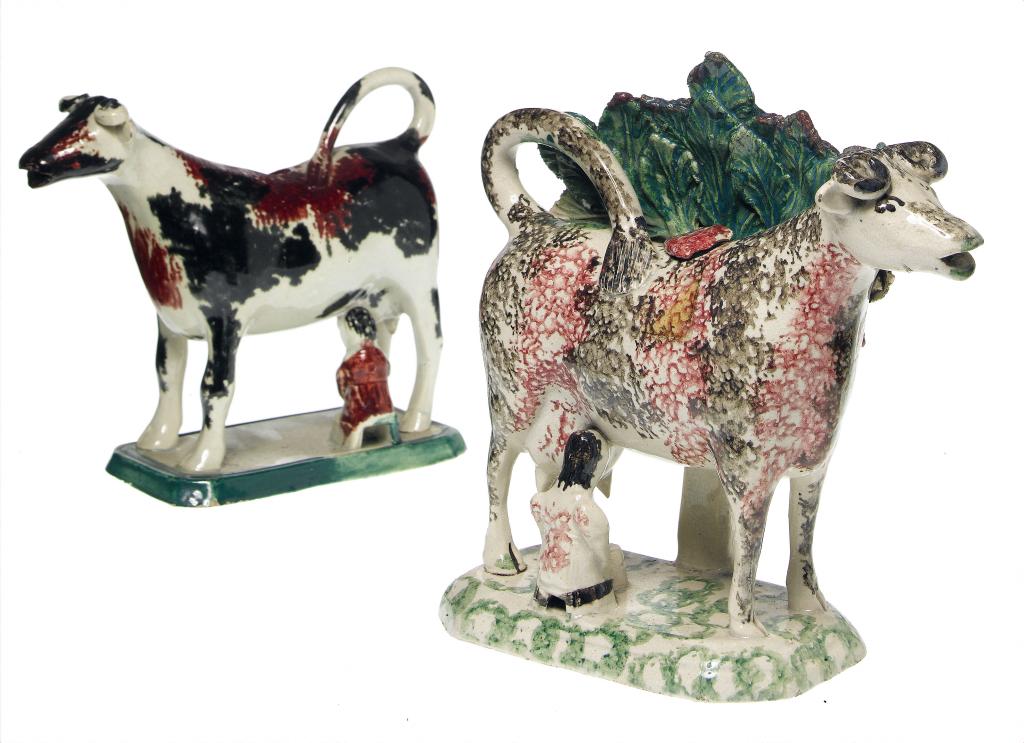 Appraisal: TWO PEARLWARE COW AND MILKMAID COW CREAMERS PROBABLY SCOTTISH one