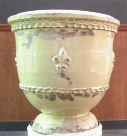 Appraisal: Large French glazed earthenware jardiniere Yellow glazed with molded fleur-de-lys