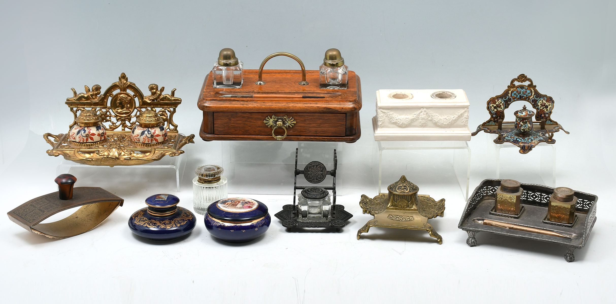 Appraisal: PC INKWELL DESK SET COLLECTION Comprising - English Standish inkwell