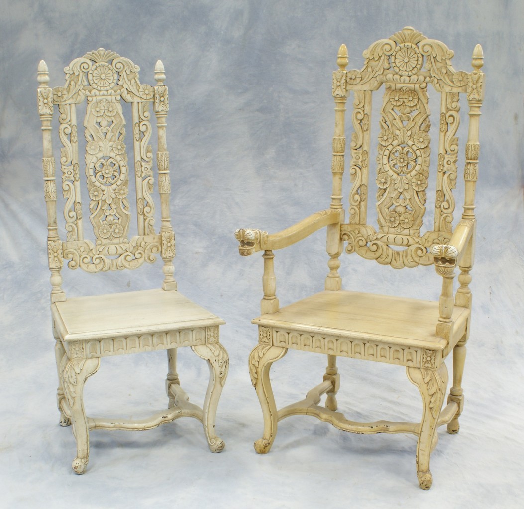 Appraisal: Pair of ivory painted lion carved oak chairs one with