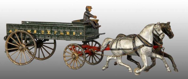 Appraisal: Cast Iron Ives Adams Express Wagon Toy Description Green painted