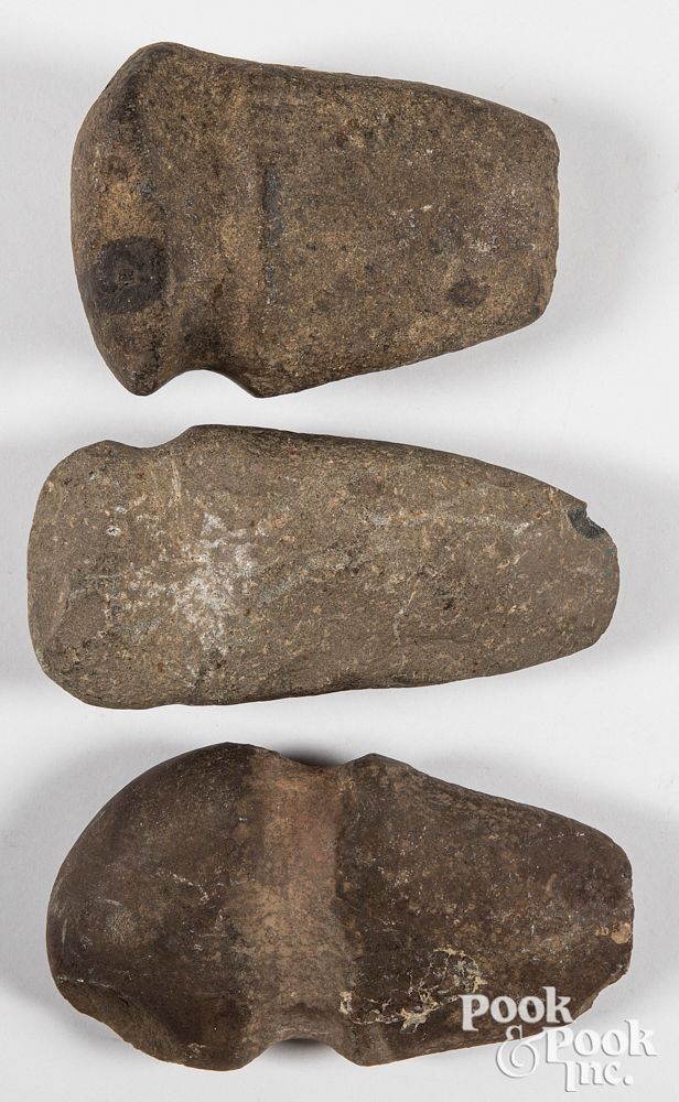 Appraisal: Three ancient Pennsylvania stone axe heads Three ancient Pennsylvania stone