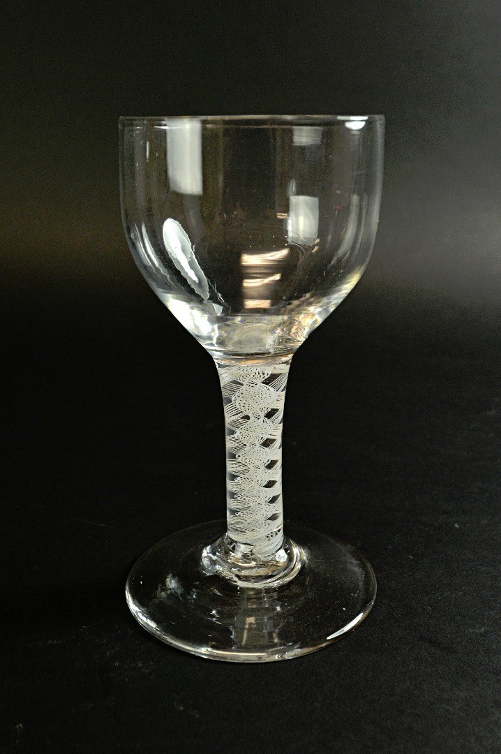 Appraisal: An English wine glass circa with large ogee bowl and