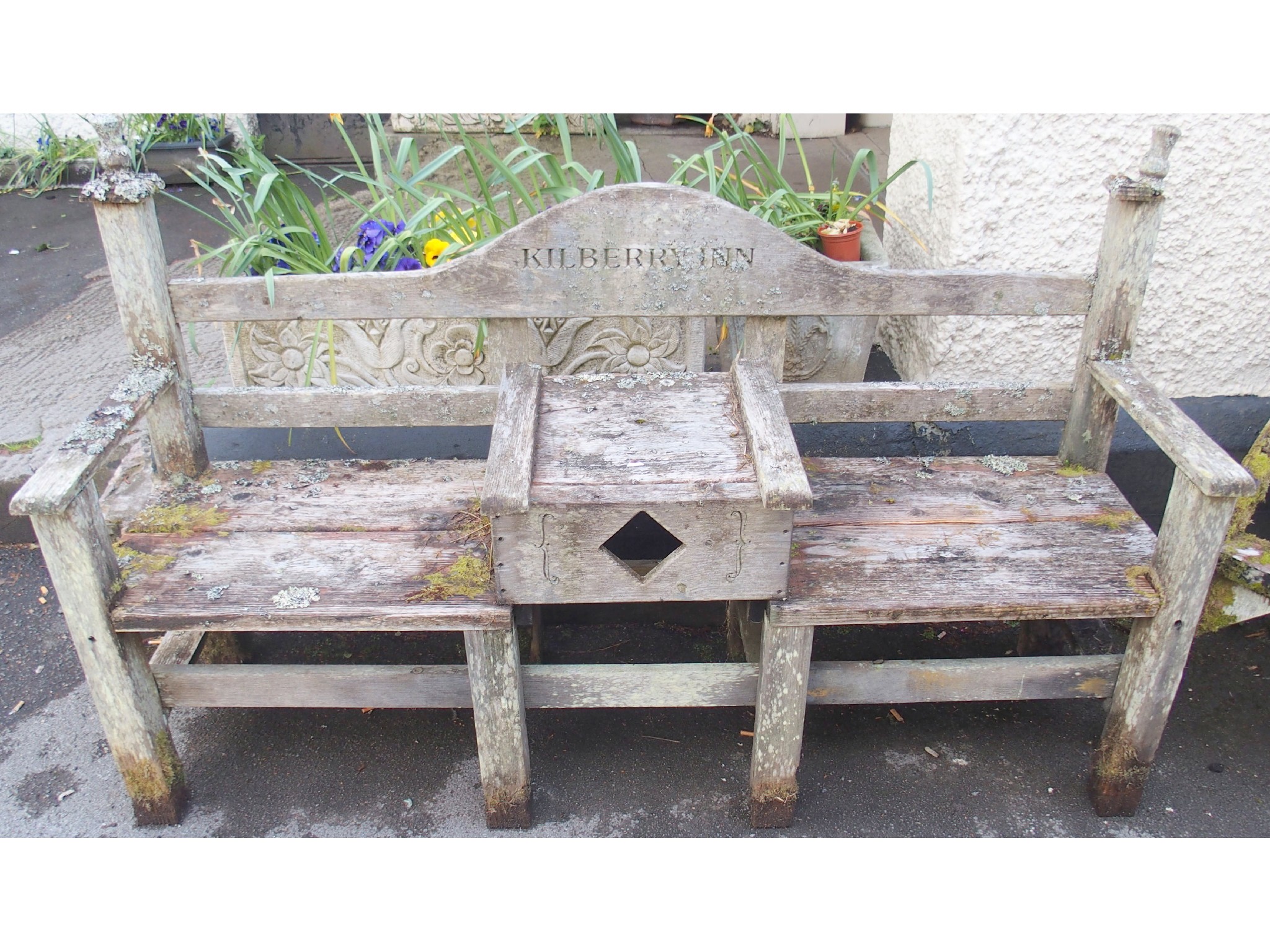 Appraisal: An oak love seat the backrest engraved Killberry Inn x