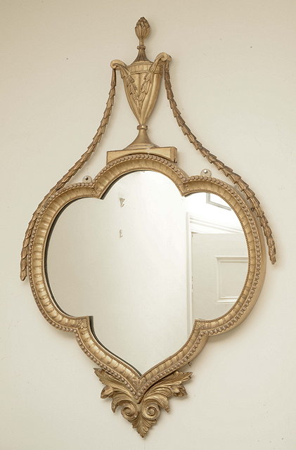 Appraisal: A PAIR OF REGENCY STYLE GILT WALL MIRRORS surmounted by