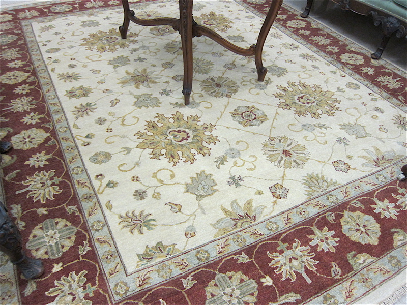 Appraisal: HAND KNOTTED ORIENTAL CARPET Indo-Persian having an overall floral decorated