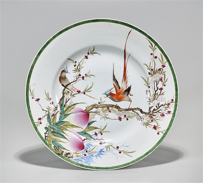 Appraisal: Chinese enameled porcelain charger with birds peaches and flowers design