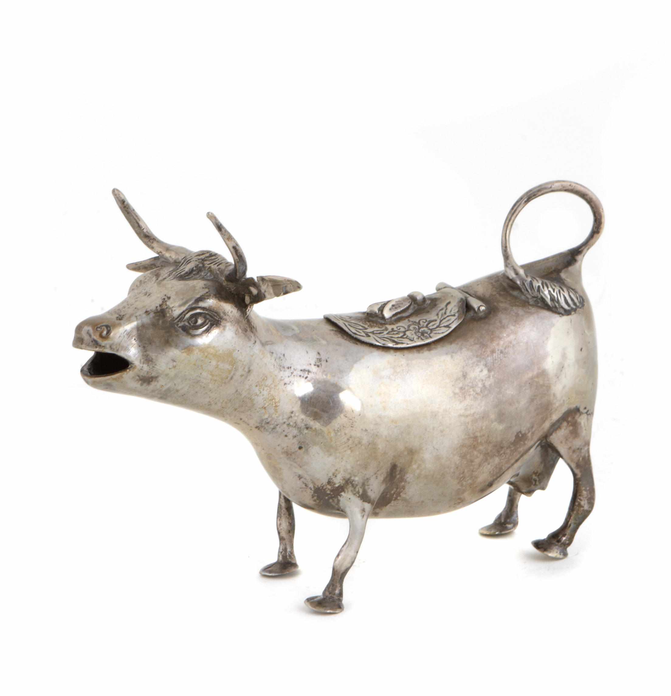 Appraisal: Silver A continental silver cow creamer Pseudo hallmarks Length in