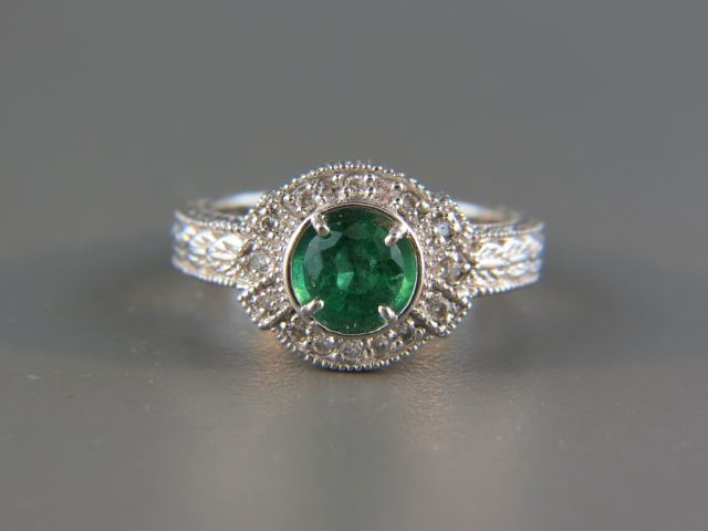 Appraisal: Emerald Diamond Ring carat round gem surrounded by round diamonds