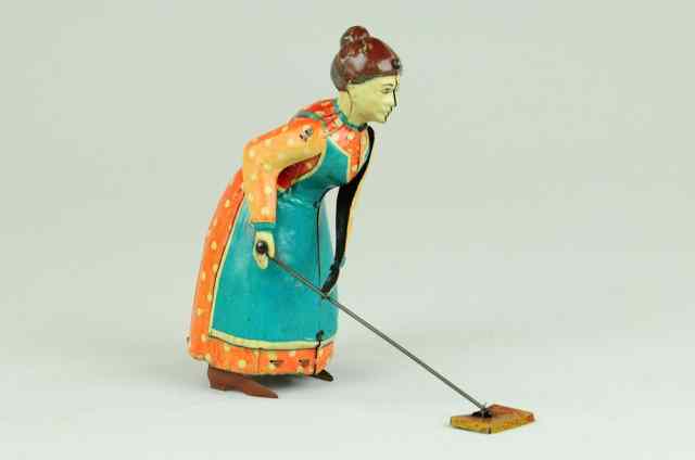 Appraisal: BUSY LIZZIE Germany lithographed tin amusing toy depicts full figured