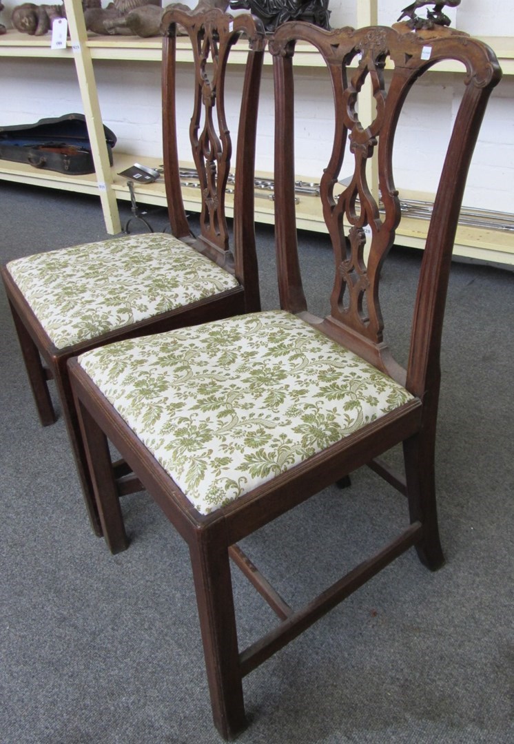 Appraisal: A pair of th century mahogany dining chairs with pierced