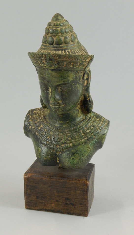 Appraisal: A hollow cast bronze bust of Vishnu green patination on