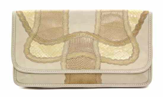 Appraisal: A Carlos Falchi Exotic Skin Patchwork Clutch with leather shoulder