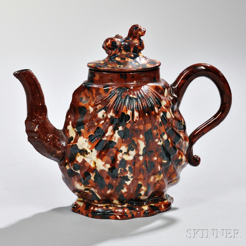 Appraisal: Staffordshire Pectin Shell Teapot and Cover England c redware ground