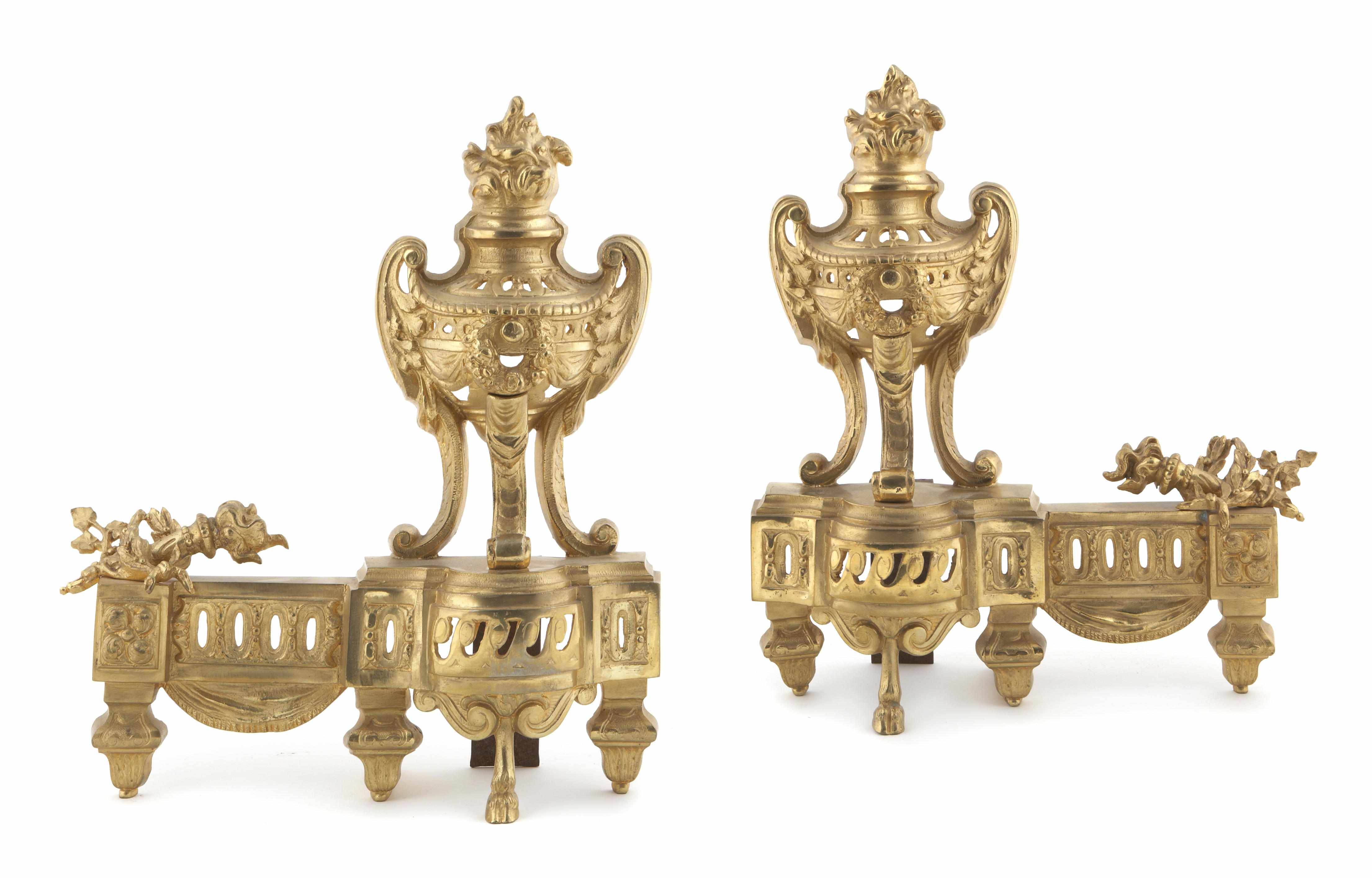 Appraisal: A pair of Louis XVI style brass chenets and a