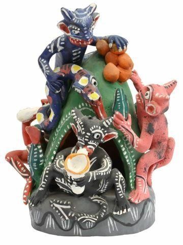 Appraisal: Folk Art polychrome pottery sculpture Five Devils and Snake Climbing