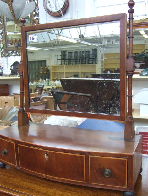 Appraisal: An early th century mahogany swing frame toilet mirror the