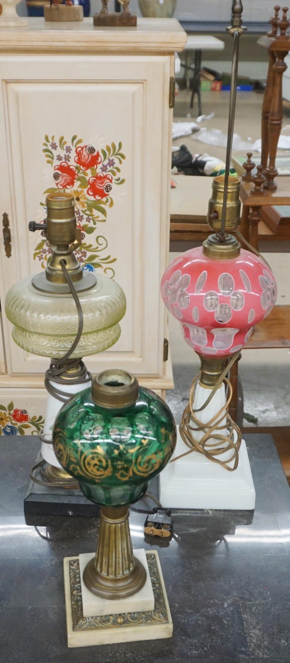 Appraisal: Three Victorian Glass Font Old Lamp Bases H of Tallest