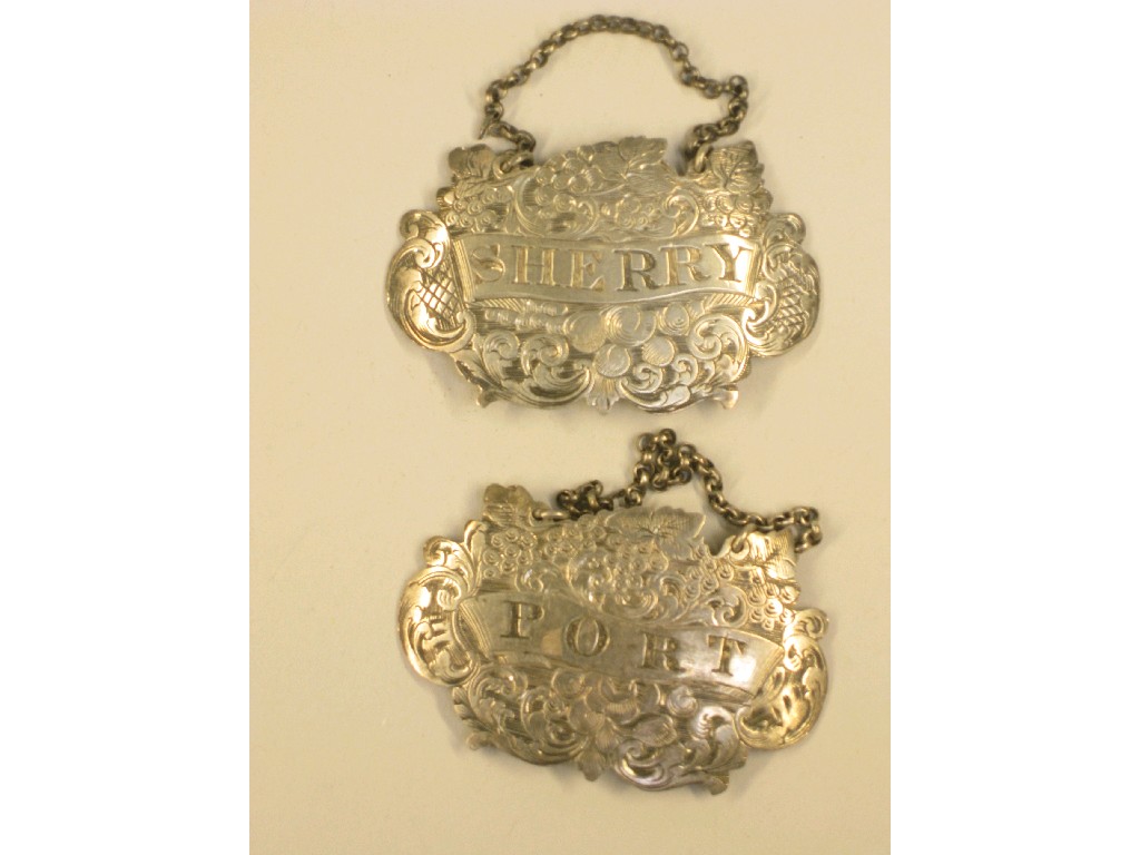 Appraisal: Pair of Victorian Bottle Tickets Port and Sherry with fruiting