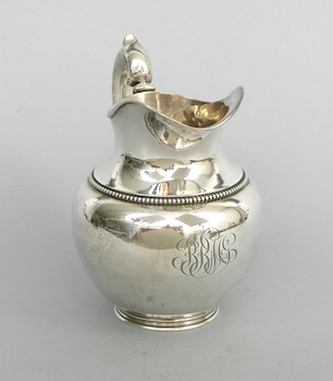 Appraisal: A Sterling Silver Water Pitcher A sterling silver water pitcher