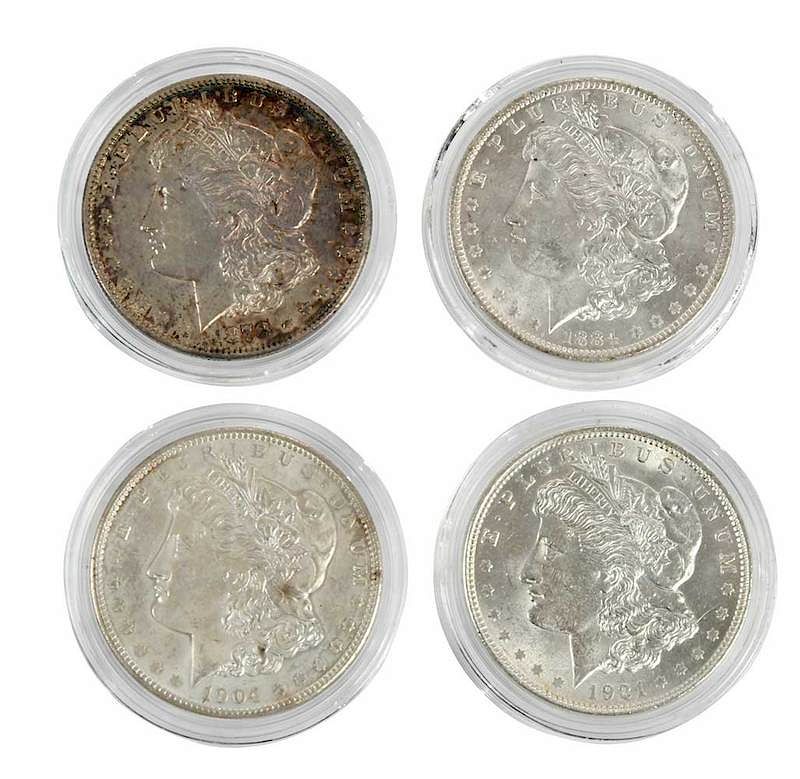 Appraisal: Ten Silver Morgan Dollars higher grade in plastic capsules seven