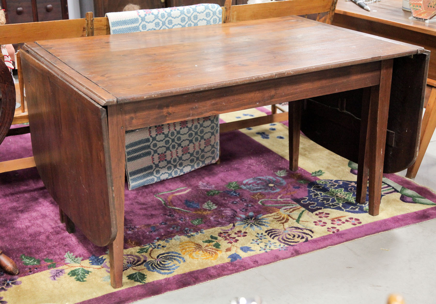 Appraisal: DROP LEAF HARVEST TABLE American mid th century walnut Large