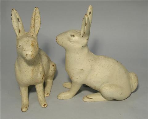 Appraisal: PAIR OF WHITE PAINTED CAST IRON BUNNIES The figures cast