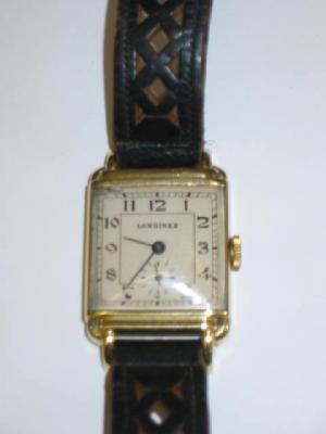 Appraisal: A GENTLEMAN'S CT GOLD CASED LONGINES WRISTWATCH the square dial