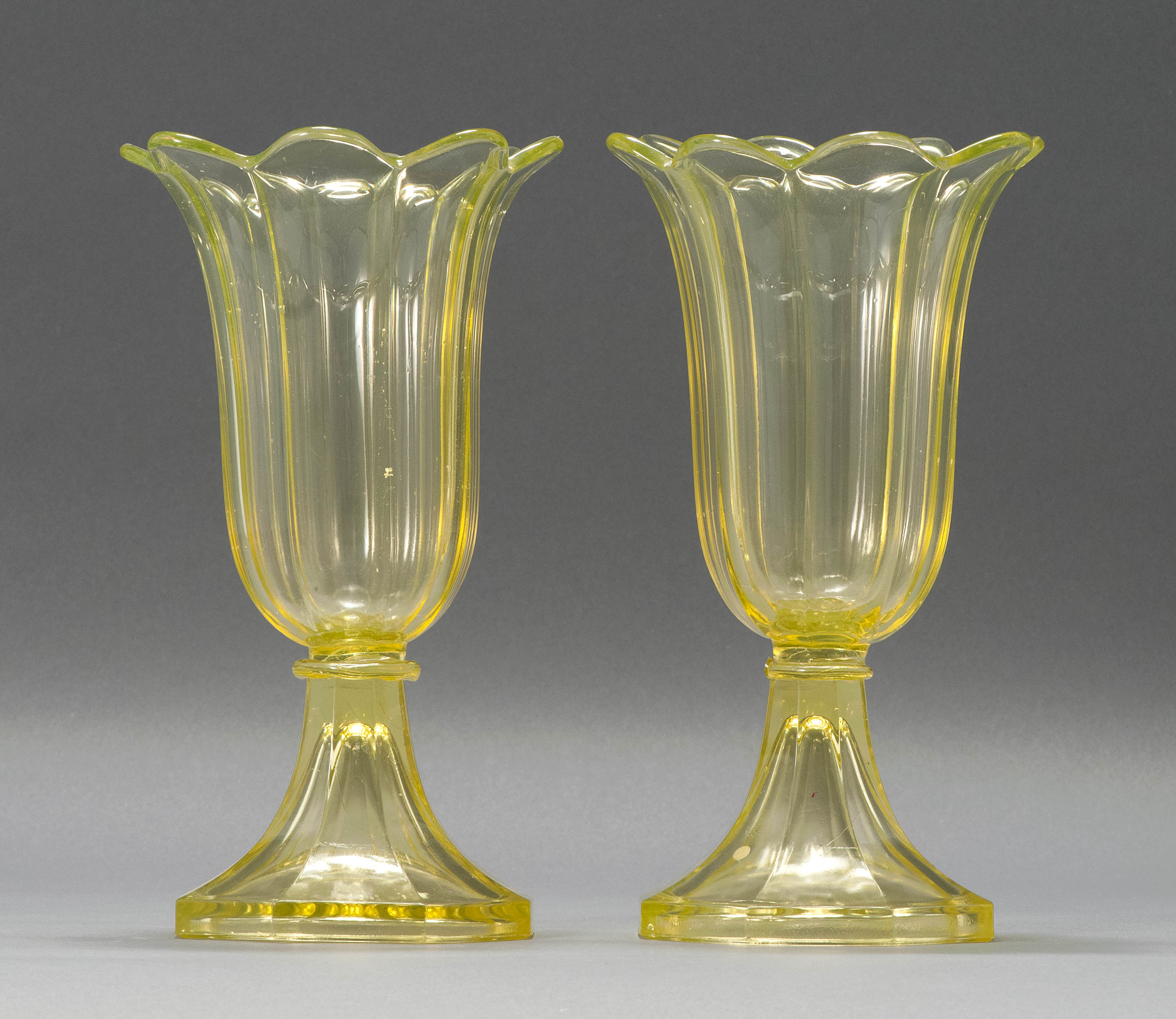 Appraisal: PAIR OF SANDWICH GLASS COMPANY PRESSED GLASS TULIP VASES Mid-