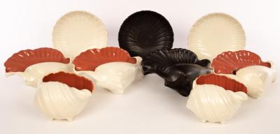 Appraisal: Poole Pottery two twintone red Indian and magnolia scallop shell