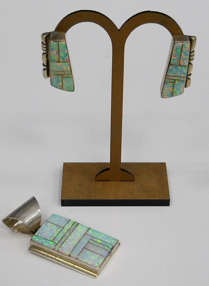 Appraisal: NAVAHO DONALD DOUGLAS STERLING OPAL SUITE By one of the