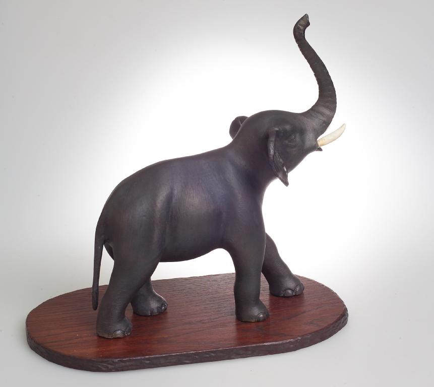 Appraisal: ORIENTAL BRONZE MODEL OF AN ELEPHANT early th century with