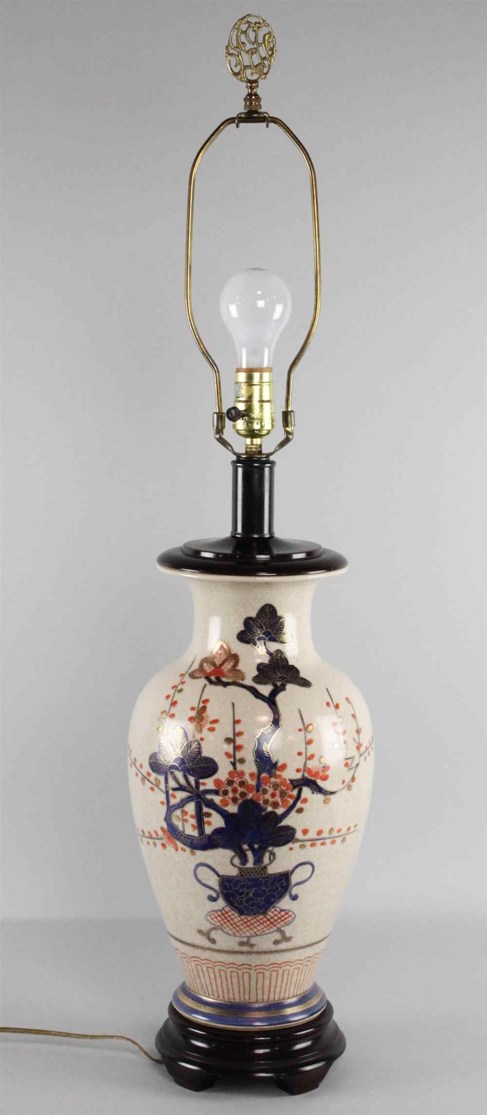 Appraisal: CHINESE BALUSTER VASE painted with a hanging flower basket drilled