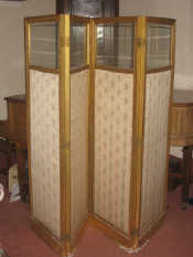 Appraisal: An Edwardian gilded four fold screen with bevelled clear glass