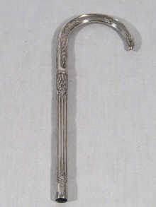 Appraisal: A silver parasol handle with acanthus leaf decoration unascribed marks