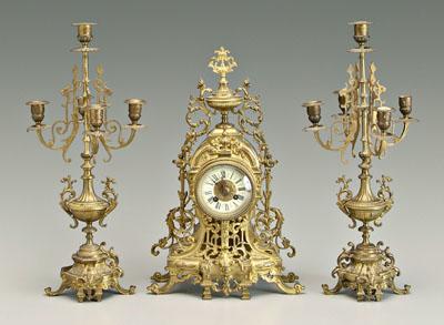 Appraisal: Bronze dore clock and garniture clock with urn pediment above