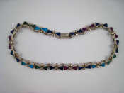 Appraisal: A white metal tests silver necklace inlaid with marcasite lapis