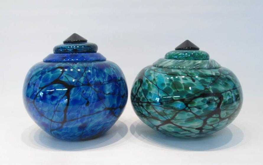 Appraisal: TWO DAVID LINDSAY ART GLASS LIDDED VESSELS similar shape and