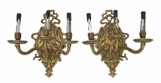 Appraisal: A Pair of Neoclassical Gilt Metal Three-Light Sconces each oval